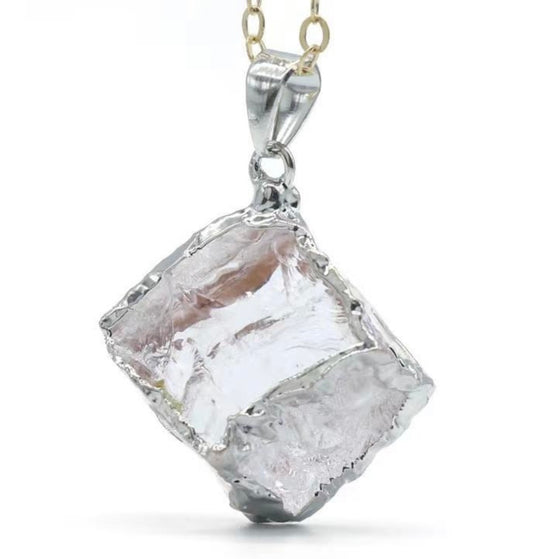 Clear quartz and silver pendant cube